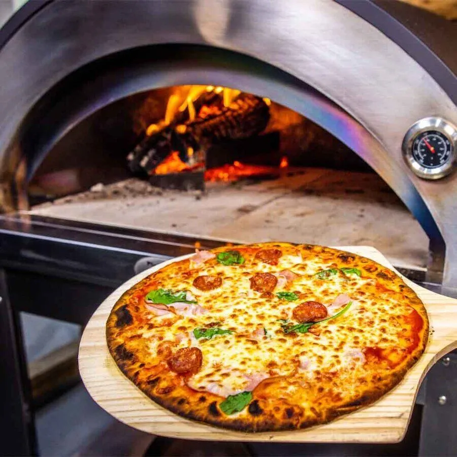 Wood fired pizza oven baking pizza on stone base with live flame for high heat cooking