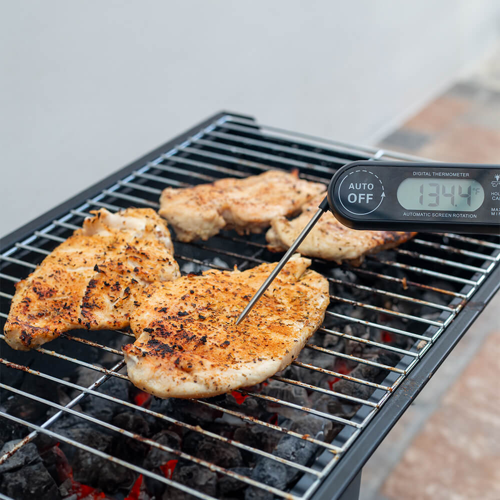 This image shows chicken being grilled.