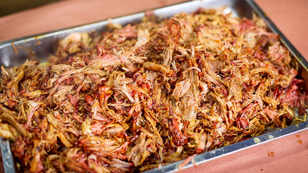 This image shows pulled pork. This image shows pulled pork.