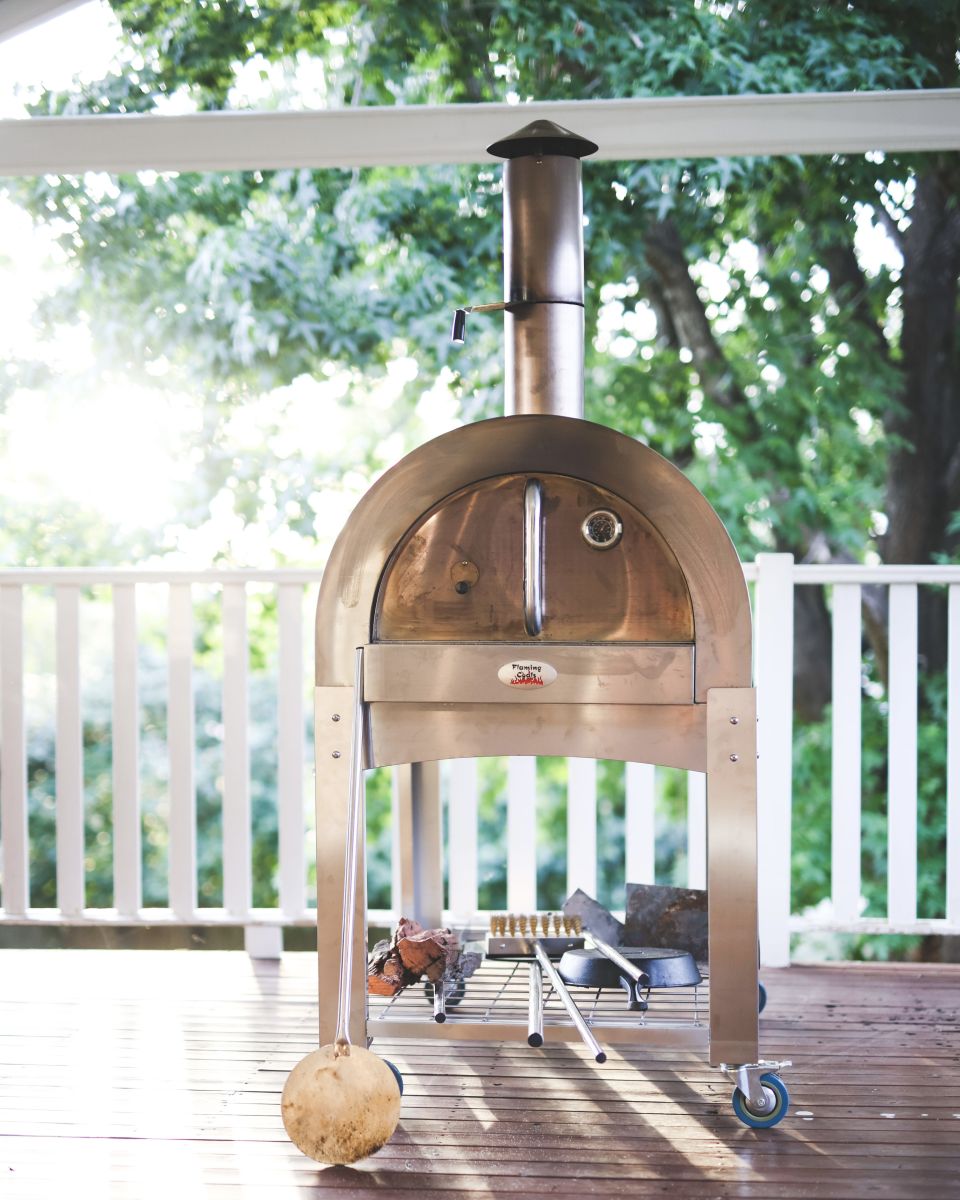 This photo shows a wood-fired pizza oven