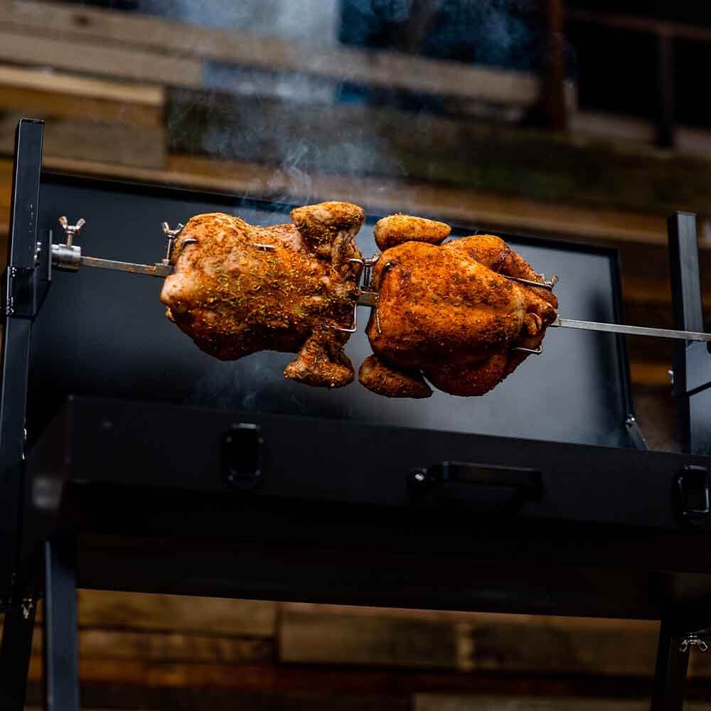 This_image_shows_Mini_Spit_Roaster_being_used_to_cook_chicken