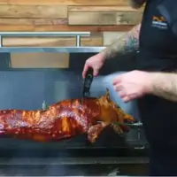 How Long Does It Take to Cook a Whole Pig on a Spit Roaster? image